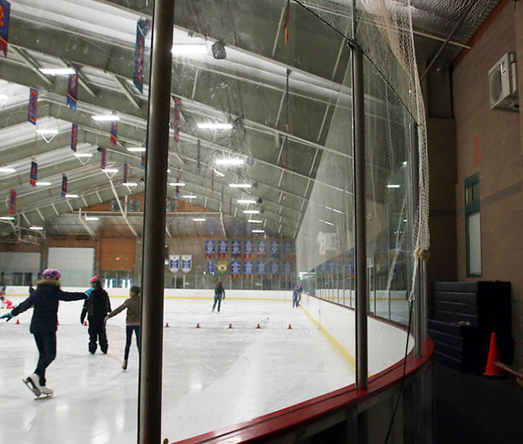 Ice skating rink with heat pump condenser pictured in upper right corner.