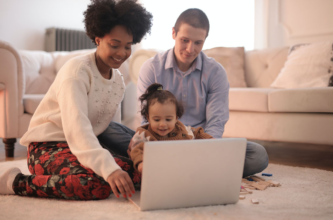 mixed race family in living room