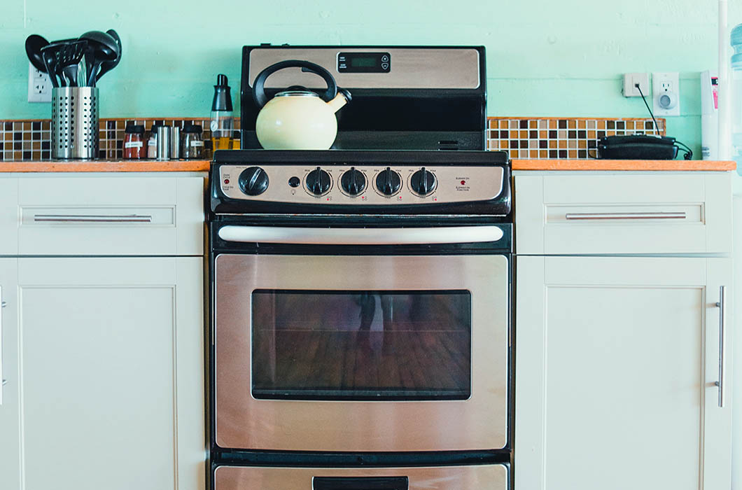 Induction stove in kitchen.