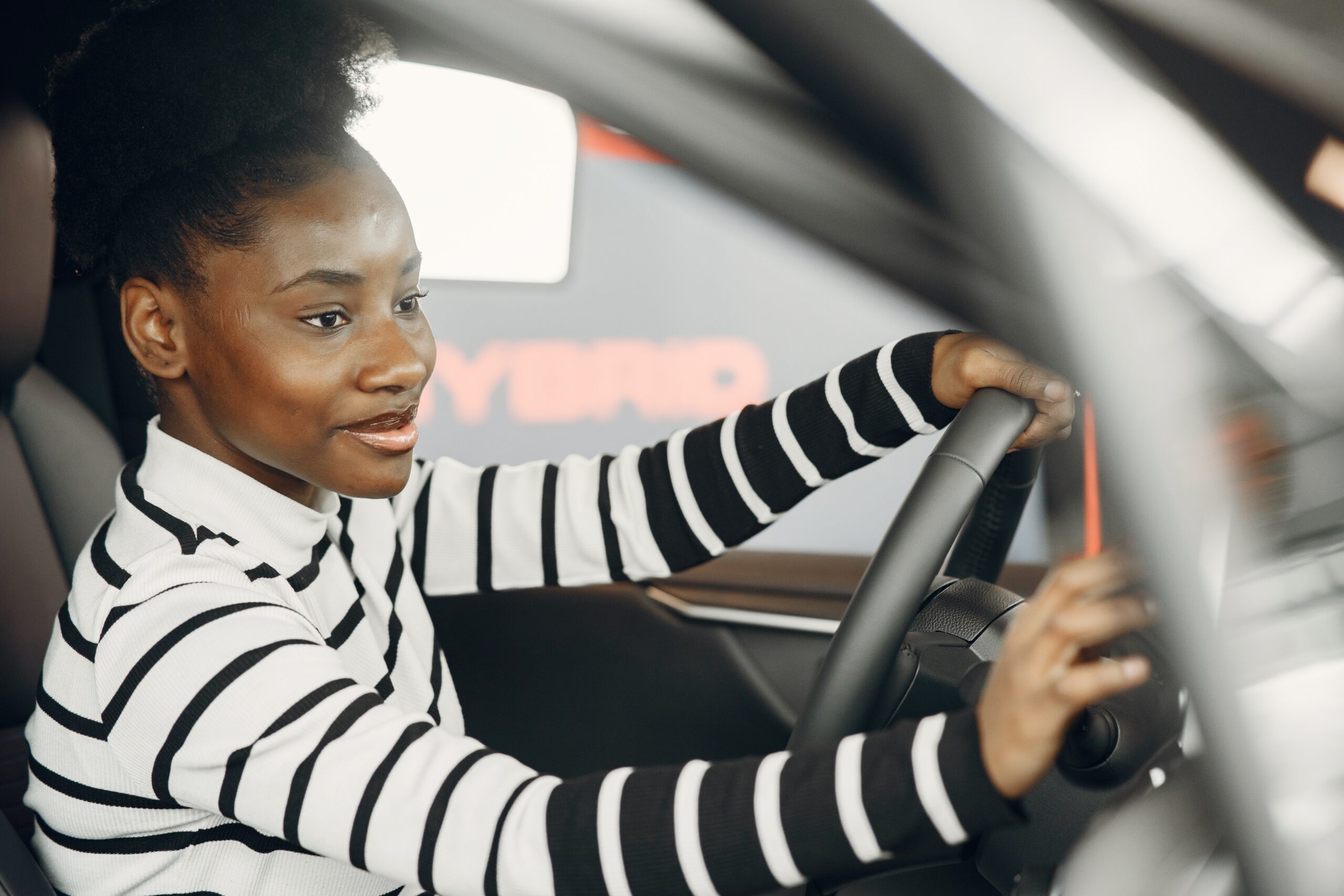 Black woman driving car